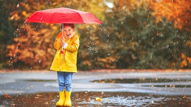Cute Photography of a Child in Rain