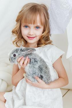 Cute Baby Girl With Rabbit