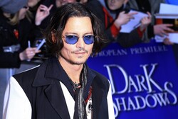 Johnny Depp At Red Carpet with Blue Sunglasses