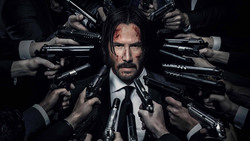 Keanu Reeves As John Wick Surrounded By Guns