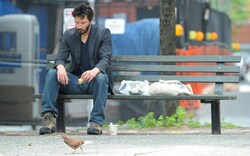 Keanu Reeves Sitting Alone On Bench