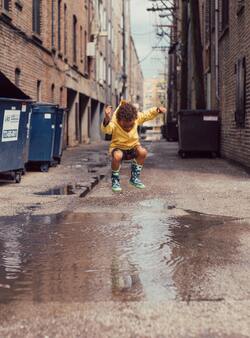Kid Jumping on Water Wallpaper