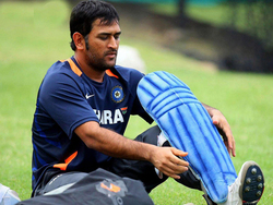 MS Dhoni Tying Pads On Ground