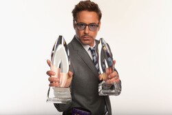 Robert Downey Jr Holding Awards In Both Hands