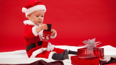 Baby Boy Enjoying Christmas Gift