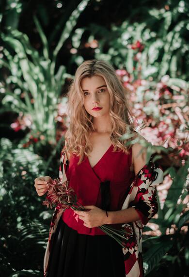 Beautiful Woman With Pretty Red Rose