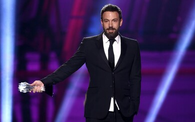 Ben Affleck Holding Award In Hand