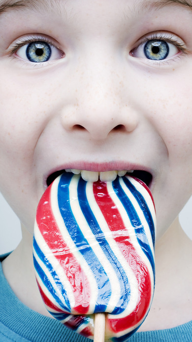 Boy Eating Lollipop Candy