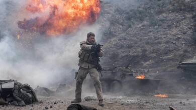 Chris Hemsworth with Gun in 12 Strong Movie Scene
