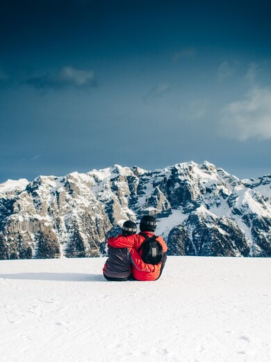 Couple Enjoy Holiday in Snow