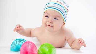 Cute Baby Lying Down on Floor