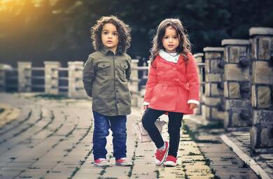 Cute Boy And Girl Standing Together