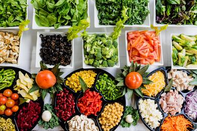 Cutting Vegetables in Restaurant Kitchen