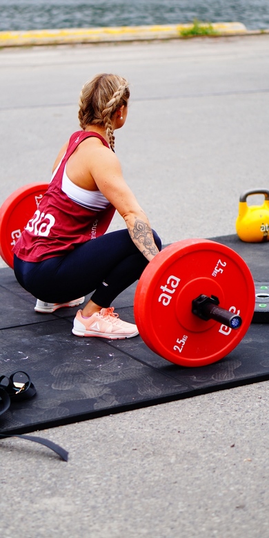 Girl Doing Weight Lifting