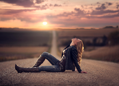 Girl Looking Towards The Sky