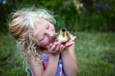 Girl With Duck in Her Hand