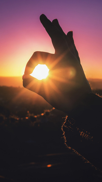 Hand Playing With Sunset