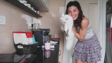 Jaqualine Fernandez with Cat at Home Photo
