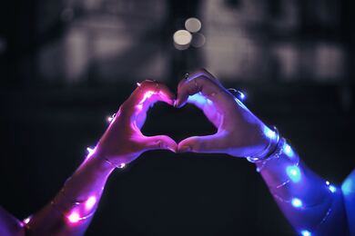 Love Couple Create Heart with Led Light Hands