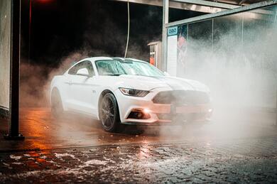 Parked White Coupe During Night