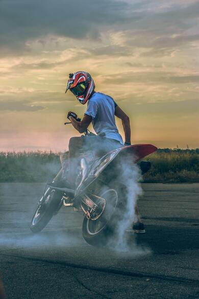 Photo of Man Riding Bike