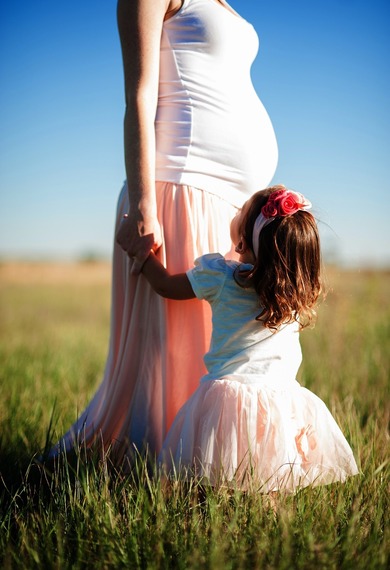 Pregnant Mother With Baby Girl