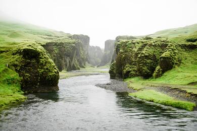 River Between Green Mountain Landscape Image