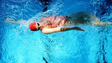 Swimmer Swimming in Pool