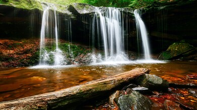 Water Falls On Brown Rock 5K