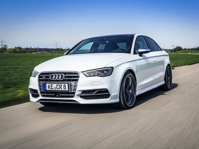 White Audi Car Drive on Road