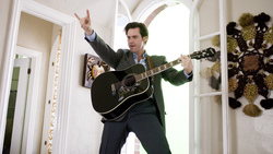 Actor Jim Carrey Playing Guitar