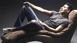 Akshay Kumar Sitting On A Couch