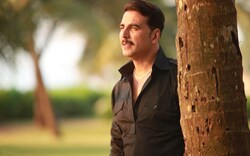 Akshay Kumar Standing Beside A Tree