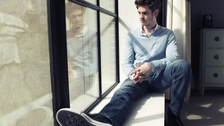 Andrew Garfield Sitting Near Window Photoshoot