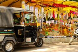 Auto Rickshaw and a Shop Colourful Wallpaper