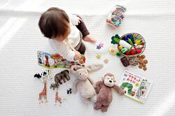 Baby Girl Playing with Toys