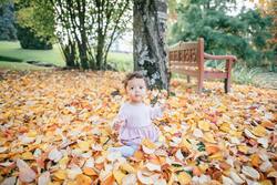 Baby Girl Seating Under Tree
