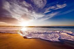 Beautiful View of Sea Wave Beach at Sunrise