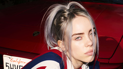 Billie Eilish Is Wearing Red Blue And White Striped Dress With Ash Eyes Facing One Side In Red Car Background 4K 8K HD Celebrities