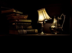 Book and Night Lamp on Desk