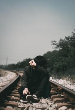 Boy on Rail Track