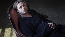Brad Pitt Sitting In Chair 4k