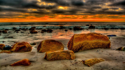 Brown Rocks in Front of Seashore 4K Background