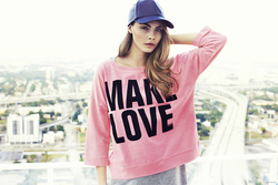 Cara Delevingne in Pink TShirt and Blue Cap