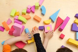 Child Playing With Creative Toys