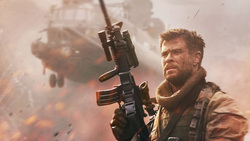 Chris Hemsworth Holding Rifle