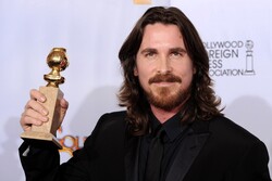 Christian Bale Holding Award Photo
