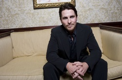 Christian Bale Sitting On Couch HD Wallpaper