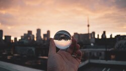 City Through Glass Ball Creative Pic