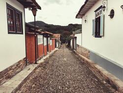 Cobblestone Pathway Between Old Houses in Town